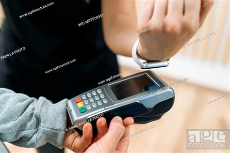 Paying Cashless With Smartwatch At Health Club Stock Photo Picture