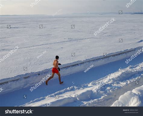 Barefooted Man Naked Torso Engaged Cold Stock Photo Edit Now 1895912941