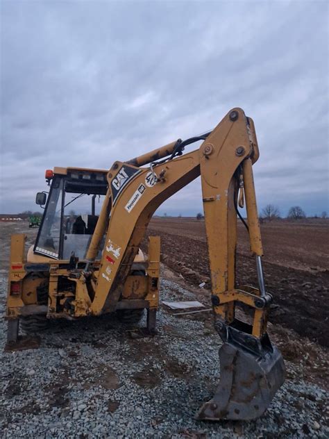 Buldoexcatavator Caterpillar C Valea Dragului Olx Ro