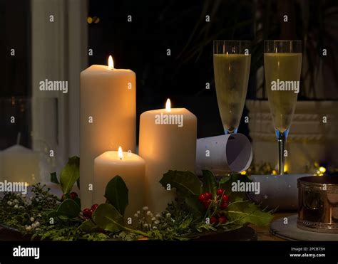 Christmas table with candles Stock Photo - Alamy