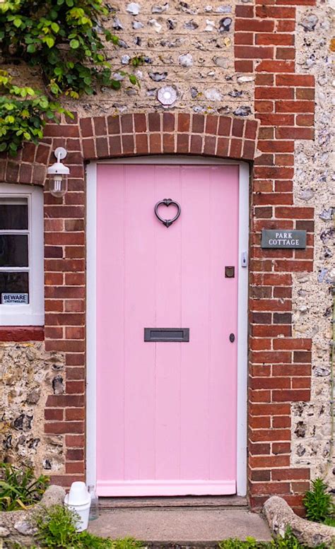 Pretty Houses In Rodmell With A Pink Front Door