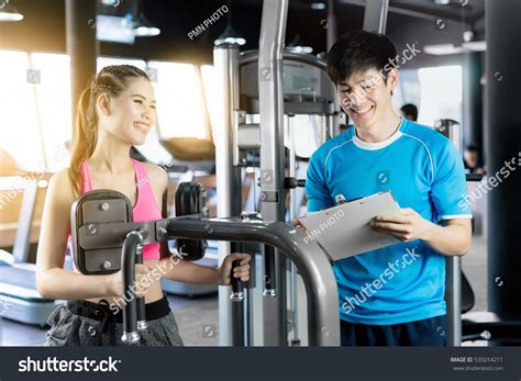 Smiling Young Woman Personal Trainer Clipboard Stock Photo 535014211