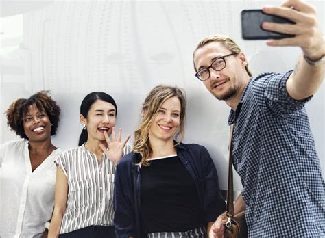 Free Stock Photo Of A Group Of People Taking A Group Selfie Download