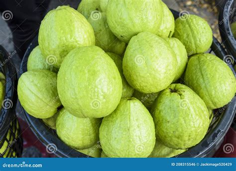 Fresh Guava Selling At Market Stock Photo Image Of People Pile