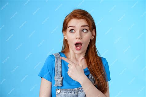 Premium Photo Surprised Speechless Ginger Girl React Shocked