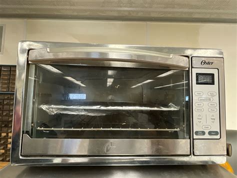 OSTER TOASTER OVEN - Cornerbids