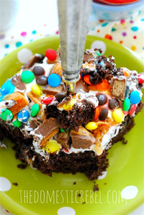 Candy Bar Poke Cake The Domestic Rebel