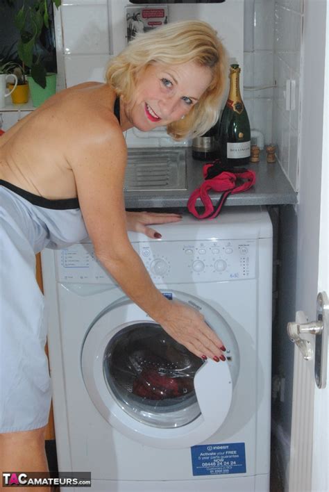 Mature MILF With Blonde Hair Wears Only An Apron While Devouring A
