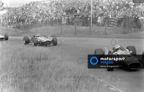 Denny Hulme Brabham Bt Repco Leads Jochen Rindt Cooper T B