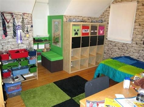 A Room With A Bed Desk And Bookcases On The Floor In Front Of A Brick Wall