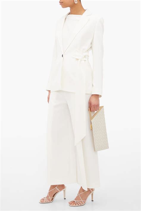 22 Beautiful Bridal Suits For Your Rehearsal Dinner Wedding And Beyond