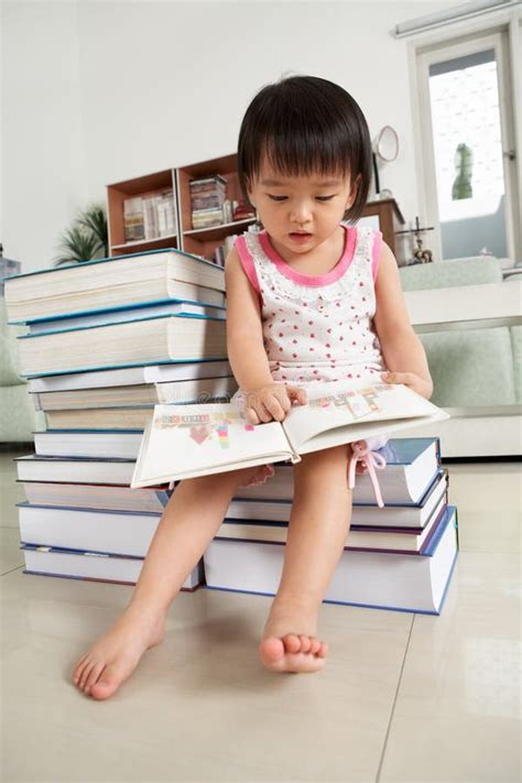 Litlle Girl Reading Lot Books Stock Photos - Free & Royalty-Free Stock Photos from Dreamstime