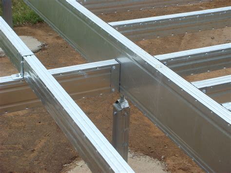 Close up of Boxspan frame over EziPiers. | Steel building homes, Steel trusses, Deck framing