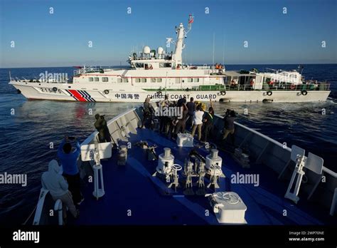 Journalists Report As A Chinese Coast Guard Ship Blocks The Path Of