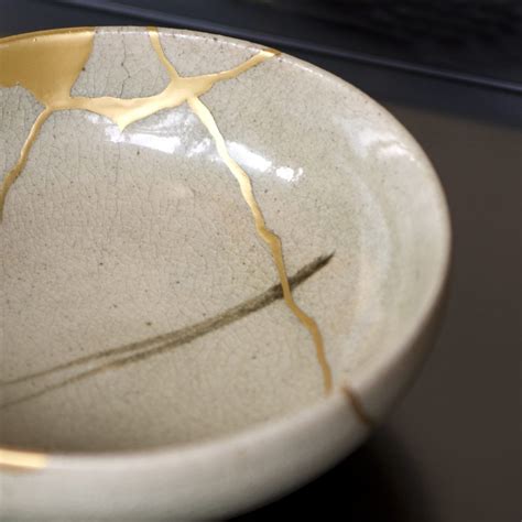 Kintsugi Golden Repair Is The Japanese Art Of Repairing Broken Pottery With Lacquer Mixed