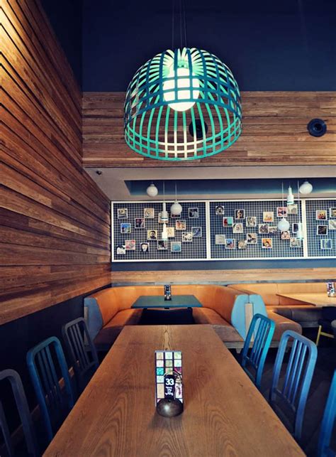 Top 5 Restaurant Interior Designs With Wooden Walls Insertions