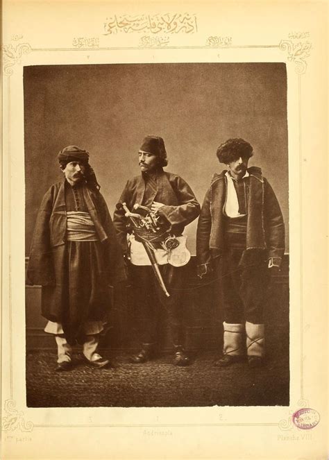 An Old Photo Of Three Men Standing Next To Each Other With Guitars In