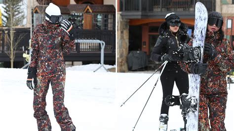 Kylie Jenner Rocks a Printed Snowsuit to go Snowboarding With Her Family | Teen Vogue