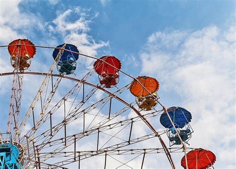 Premium Photo Entertainment Ferris Wheel Against The Blue Sky