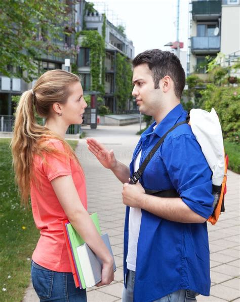 Two Students Talking On Campus Stock Photo - Image: 40148882