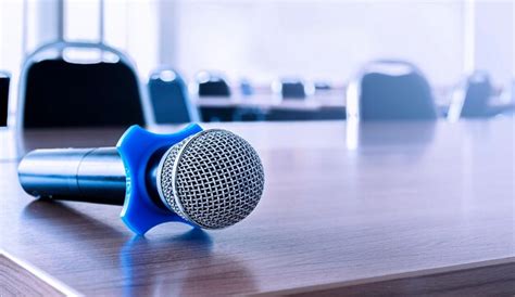 premium photo close  microphone  table  seminar room