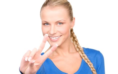 Premium Photo Bright Picture Of Lovely Blonde Showing Victory Sign