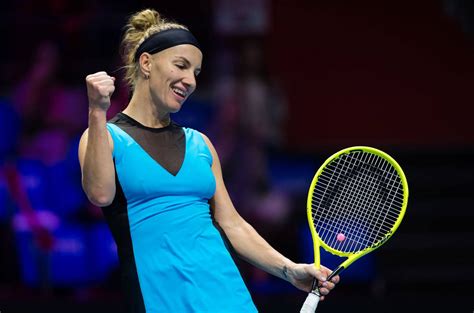 Download Svetlana Kuznetsova Gleeful Fist Pump Wallpaper | Wallpapers.com