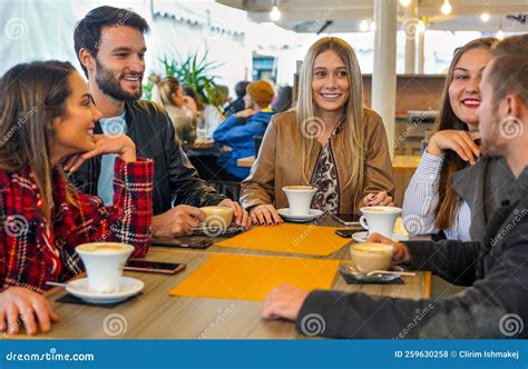 Group Of People Drinking Cappuccino In A Bar Friends Hanging Out With