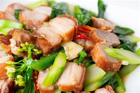 Crispy Pork Belly Stir Fry With Chinese Kale Stock Photo Image Of