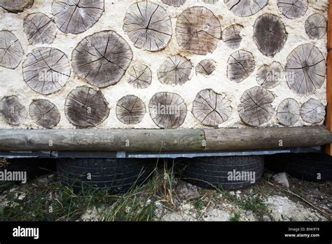 Cord wood wall,sustainable building Stock Photo - Alamy