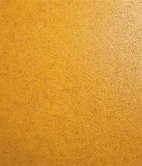 Premium Photo | Texture background a yellow wall with a brown background