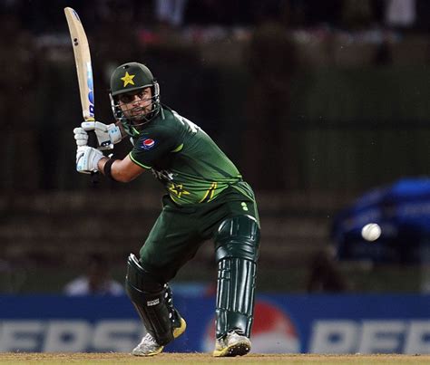 Ahmed Shehzad dances down the track | ESPNcricinfo.com