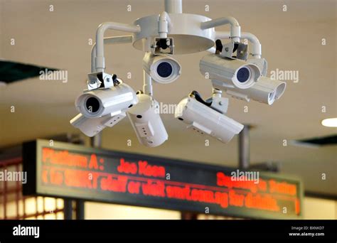 Singapore: surveillance cameras at a MRT (Mass Rapid Transit) subway ...