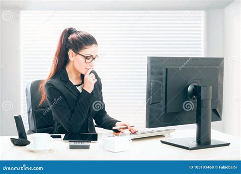 Female Accountant At Her Desk In An Office Stock Photo - Image of cute, desk: 103193468