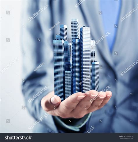 Hand Holding Building Photos and Images | Shutterstock