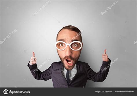 Funny person with big head Stock Photo by ©ra2studio 329534500