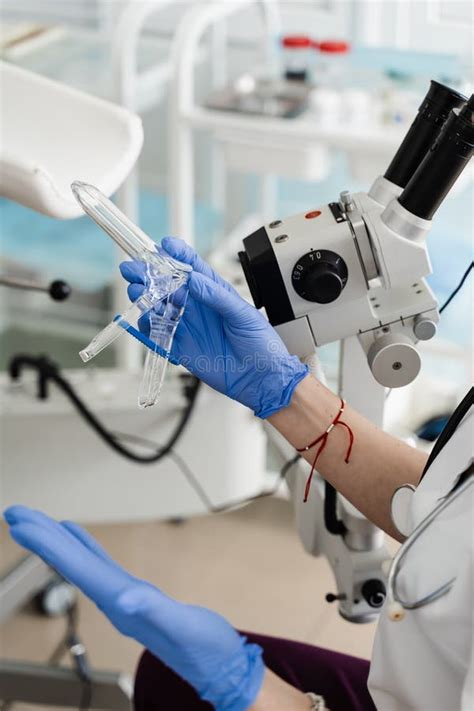 Speculum Close Up In Gynecologist Hands For Colposcopy Procedure To