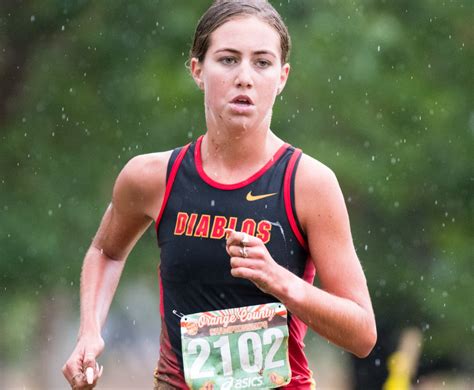 Mission Viejo’s Kelli Hines slips and slides her way to win at muddy ...