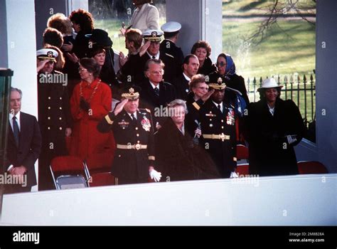 Vips And Their Wives Observe The Inauguration Day Parade For George H W