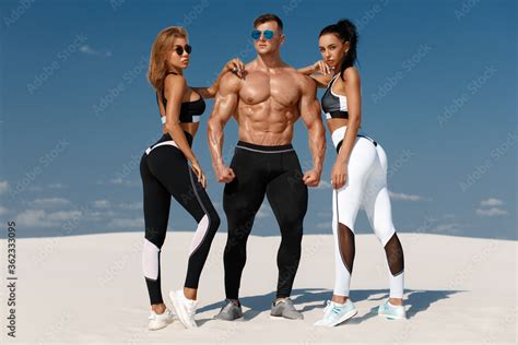 Sporty Fitness Models In Sportswear Athletic Man And Women In Leggings