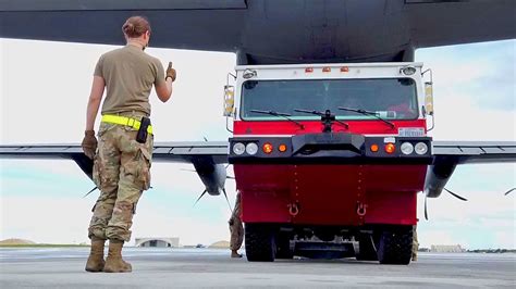 Us Air Force Airmen Load A Fire Truck In A C 130j Super Hercules