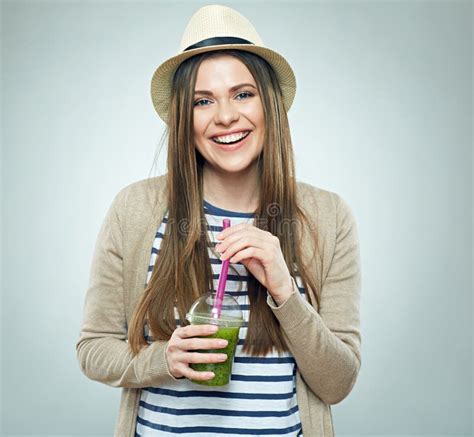 Smiling Girl Wearing Hipster Hat Holding Glass With Green Smothie Juice