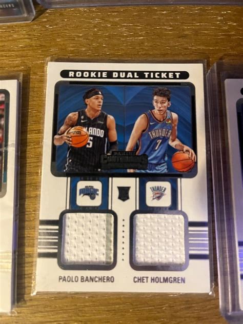 2022 23 Panini Contenders Rookie Ticket Dual Swatches RT2 CHB Paolo