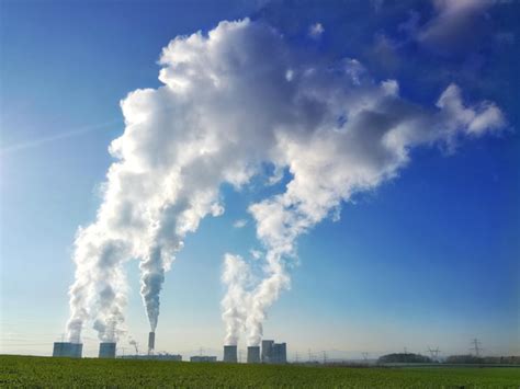 Premium Photo Smoke Emitting From Chimney Against Sky