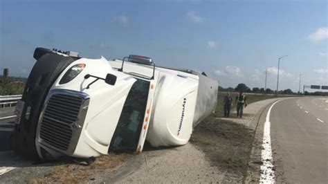 Driver Suffers Minor Injuries After Tractor Trailer Rollover On Highway