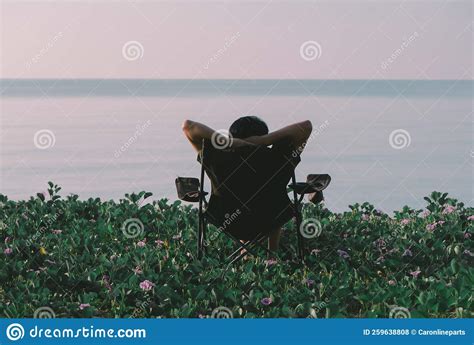 Man Relaxing on the Beach, Back View, Healthy and Vacation. Stock Photo ...