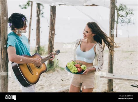 Photo Of Lovely Cute Couple Spend Their Honeymoon At Tropical Island