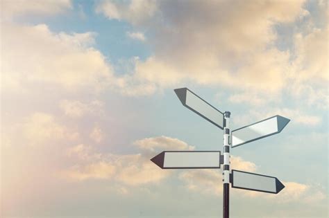 Premium Photo The Blank Directional White Road On Sky Background