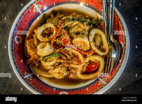 Dinner - seafood curry Stock Photo - Alamy