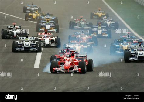 Dpa German Formula One Pilot Michael Schumacher Leads The Pack Into